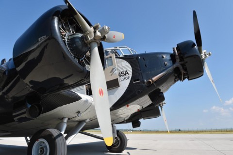 Propeller plane Ju 52 on the tarmac