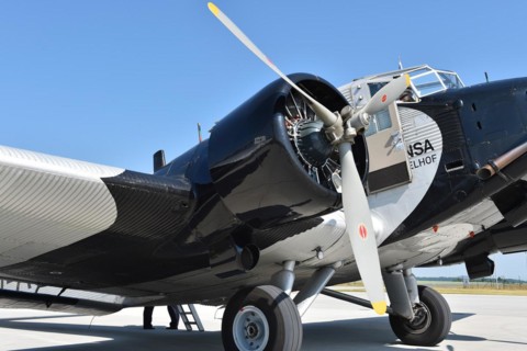 Propeller plane Ju 52 on the tarmac