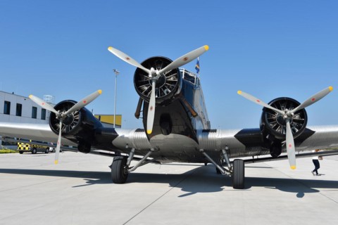 Propeller plane Ju 52 on the tarmac