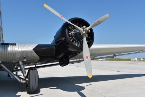 Propeller plane Ju 52 on the tarmac
