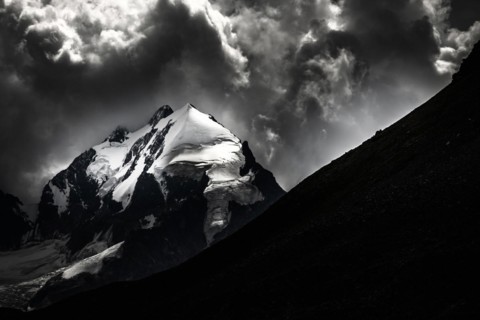 Piz Rosegg with Bernina Group and cloudy sky