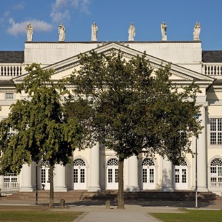 Fridericianum with an oak tree planted by Beuys to accompany his sculpture Stadtverwaldung statt Stadtverwaltung