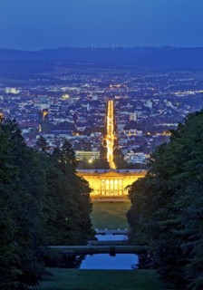 Bergpark Wilhelmshoehe with the view over the central park axis to Kassel in the blue hour