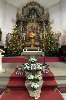 Altar of the late Baroque St Bartholomews Church decorated for Christmas