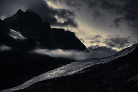 Bernina Group with Rosegg Glacier and dramatic clouds at blue hour