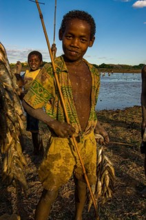 Young boys with their fresh caught fish