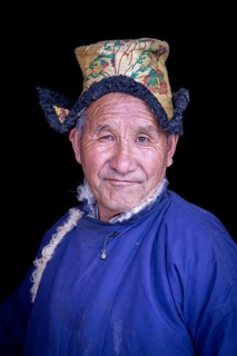 Elderly man in traditional Ladakhi clothes