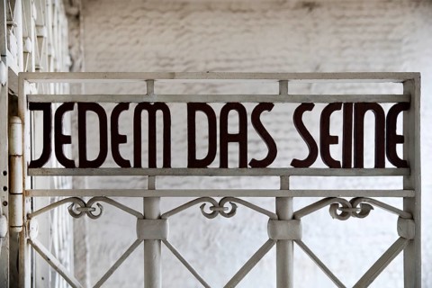 Entrance gate to beech forest concentration camp with the saying Jedem das Seine
