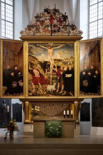 Interior view with altarpiece by Cranach