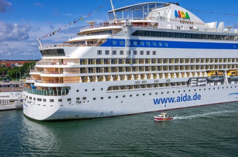 The cruise ship AIDAmar at the quay wall of the Warnemuende Cruise Center in the port of Rostock-Warnemuende