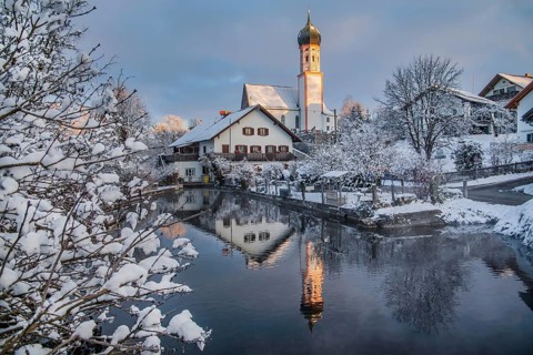 Uffinger Ach with parish church in winter