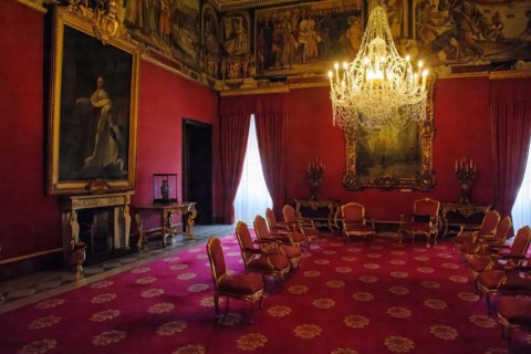 View from throne of Grand Master into historic Ambassadorial Hall with large luminous chandelier in Grand Masters Palace Palace of Knights of Malta Knights of Malta historic Order of St John