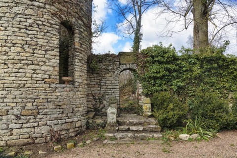 Tower and wall with gate to the baroque garden