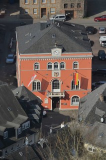 Historic town hall built 1833 with national flag and state flag
