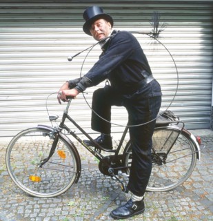 Chimney sweep in professional training and posing in a photo studio