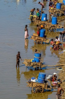 Locals getting water from the Mandrare river