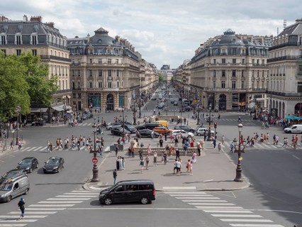 View from the balcony of the Opera Garnier building onto the Pl. de lOpera towards Av. de lOpera