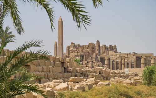 Temple ruins with 2 obelisks in the temple area of Thutmosis III