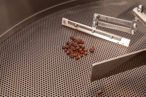 Ready roasted coffee beans cooling down