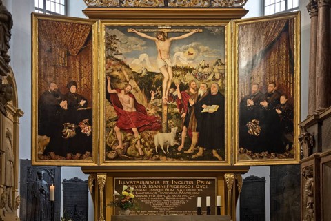 Interior view with altarpiece by Cranach