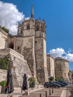 Lively Pl. Michel Debre in the town and Saint Hubert Chapel
