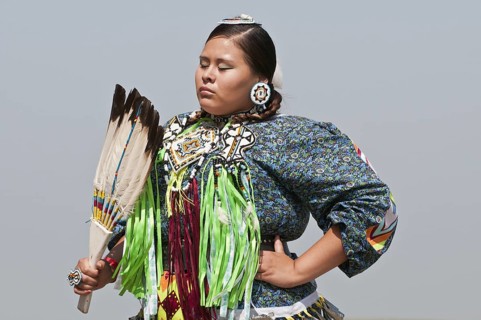 Female dancer in jingle dance regalia