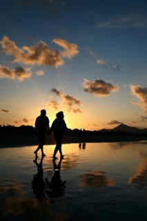 Sunset reflected on Caleta de Famara beach