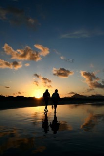 Sunset reflected on Caleta de Famara beach