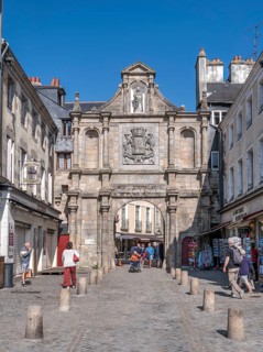 Historical site City gate Porte Saint Vincent at the entrance to the old town