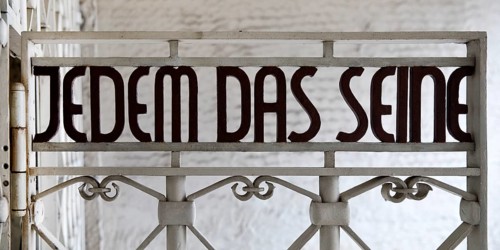 Entrance gate to beech forest concentration camp with the saying Jedem das Seine