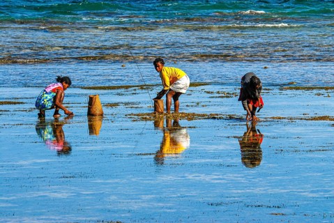 Locals fishing in the waters of the Island Ile Sainte Marie