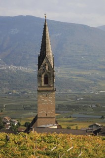 Parish Church of St. Quirikus and Julitta in Tramin with the highest brick church tower in Tyrol