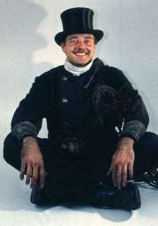 Chimney sweep in professional training and posing in a photo studio