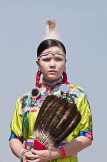 Female dancer in jingle dance regalia