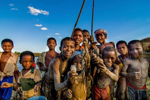 Young boys with their fresh caught fish