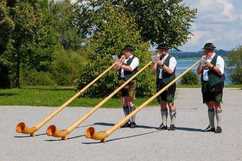 Alphorn blowers at the Forggensee