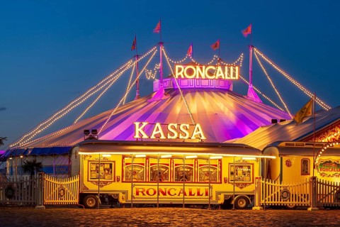 Circus Roncalli at dusk on the Buergerweide