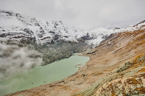 Clouds lying in the valley at Pasterze Hochalpengletscher
