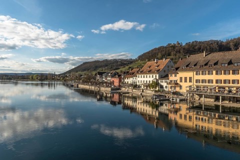 View over the Rhine to the old town with lakeside promenade and Hohenklingen Castle