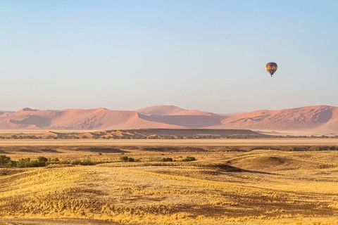 Hot air balloon over dune landscape of Sossusvlei