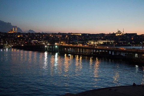Ataturk bridge on Golden Horn at night on display