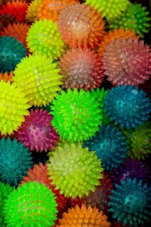 Colorful plastic balls for entertainment as a background