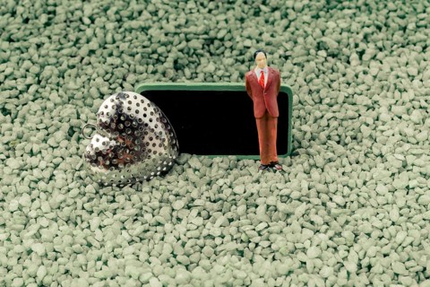 Heart and tiny man figurine model and notice board