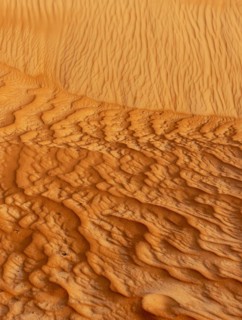 Natural patterns and ripples in the sand