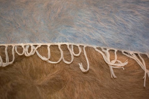 Gray and blue felt like fabric material forming a texture background