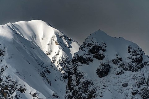 Peak of the Koellenspitze in snowy mountain landscape