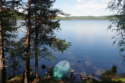 Small boat lying on a deserted lake
