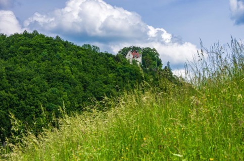 Landscape of the Swabian Alb with a view of Uhenfels Castle near Seeburg between Bad Urach and Muensingen