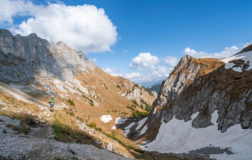 Hiker on hiking trail to the Rote Flueh