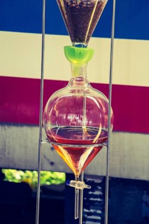 Herbal tea distilling mechanism with flasks in the view